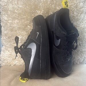 Nike Black Sneakers with Silver and Yellow Accents